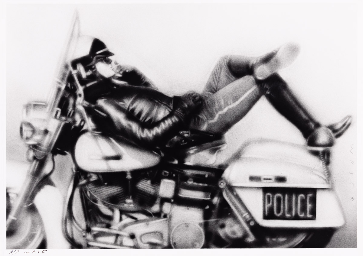 RANDAL (RANDY) WEST (DATES UNKNOWN) Reclining cop on motorcy