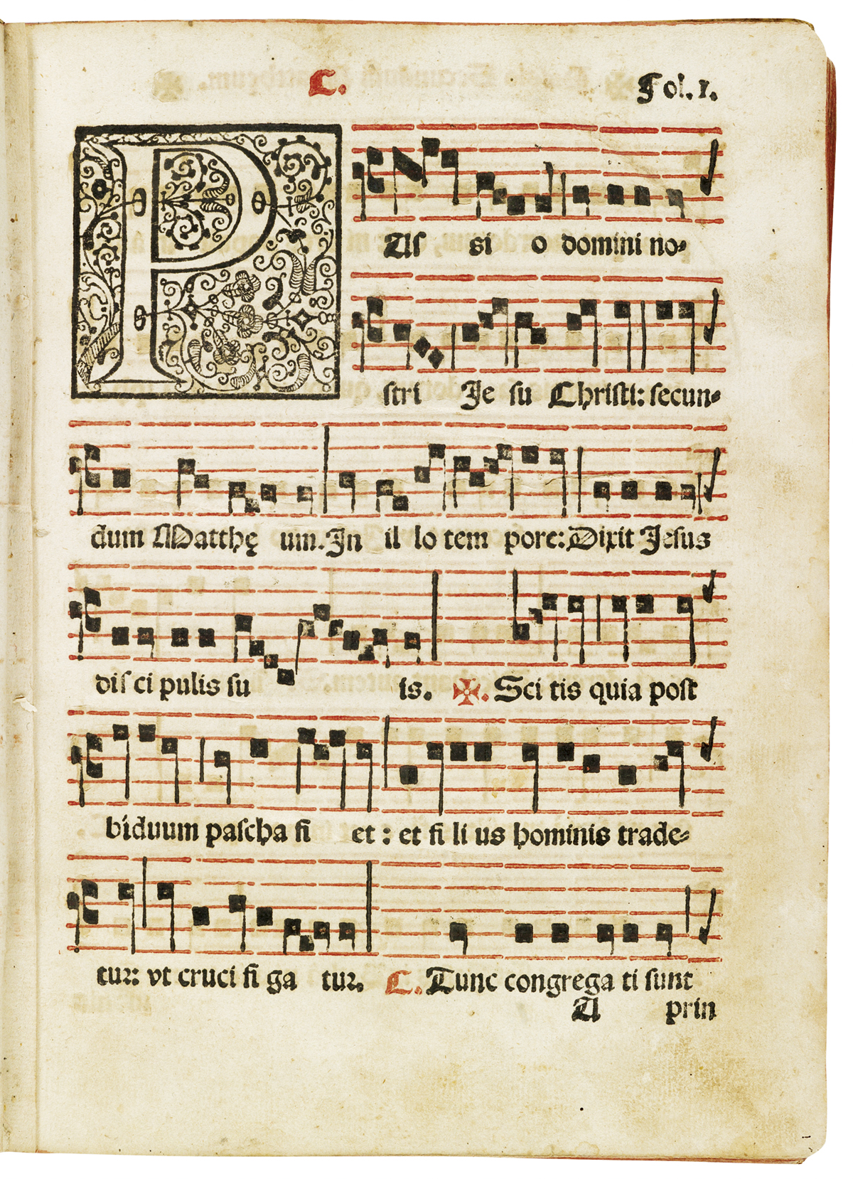 Folio 1r: staves printed in red, notation in black; blackletter text